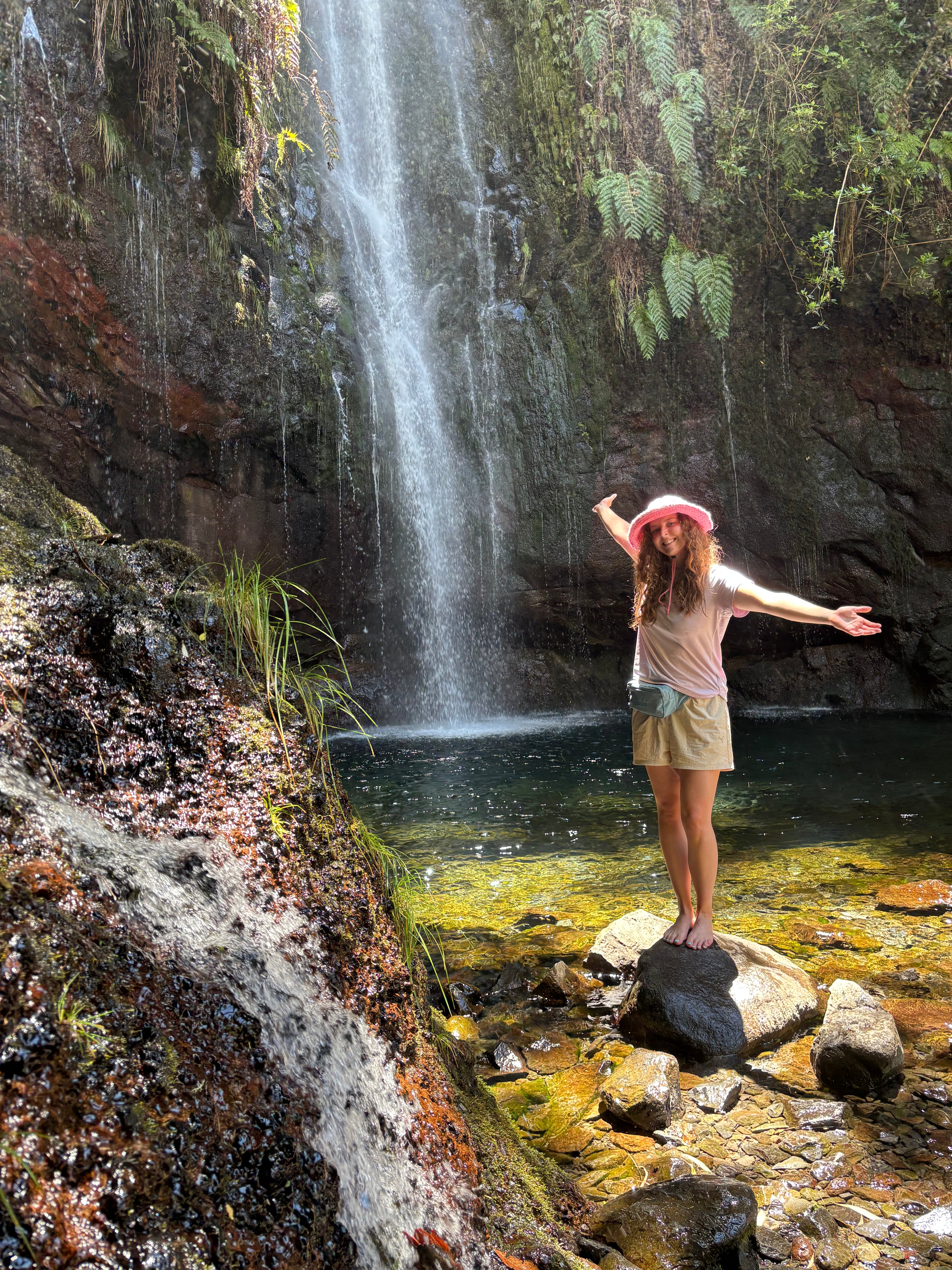 Liv infront of a waterfall in Madiera.